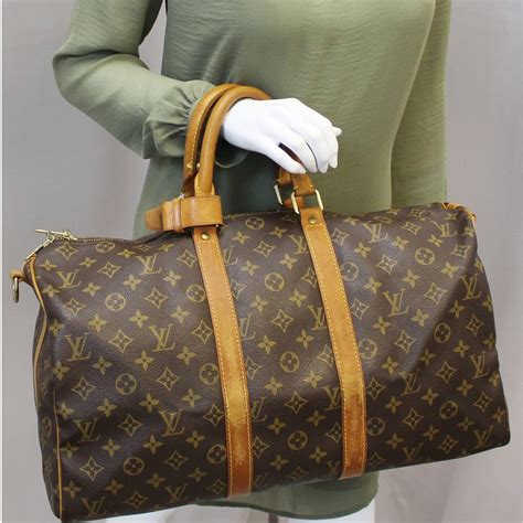 louis vuitton duffle bag uk price|louis vuitton duffle bag suitcase.